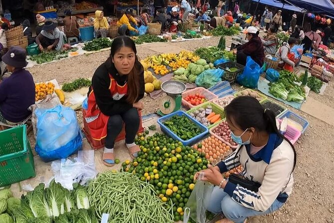 Home-cooked dinner & Baci ceremony with Villagers in Ban Nasang - A Small-Group Hmong Dinner Where the Market Leads the Way