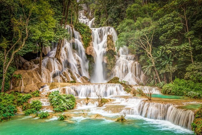 Luang Prabang City Tour & Kuang Si Waterfalls - Alms giving at dawn, then the morning market