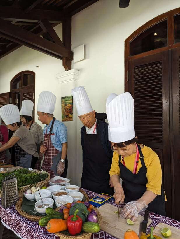 Luang Prabang: Cooking Class at the Former Royal Palace - Alame Restaurant kitchen time: hands-on cooking you actually do