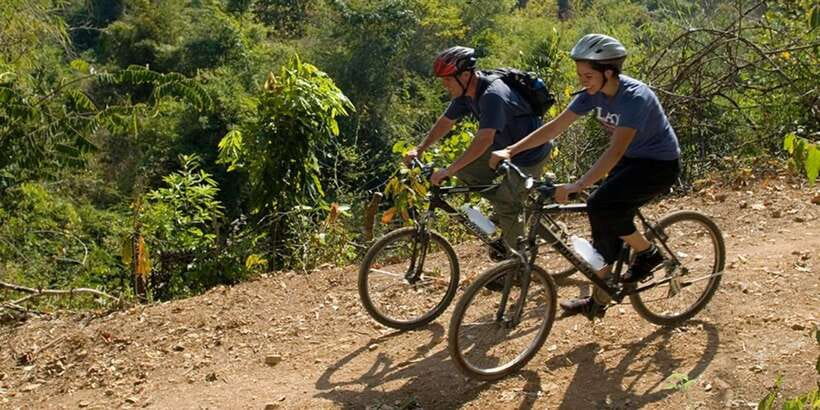 Luang Prabang: Countryside Mountain Bike Tour with Lunch - Lunch by the water: pretty setting, but bring your standards