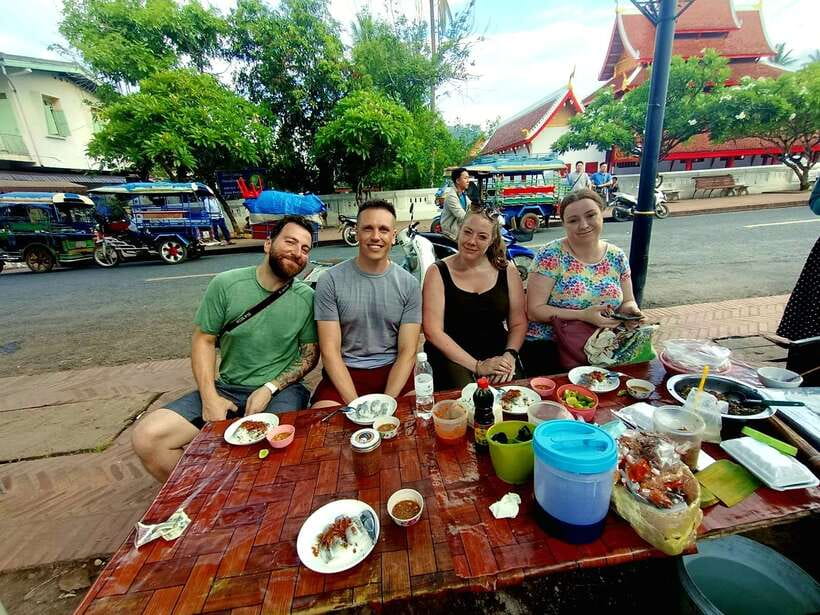 Luang Prabang: Foodie Walking Tour & Monk Blessing - Main street Lao snacks: what you learn while you taste