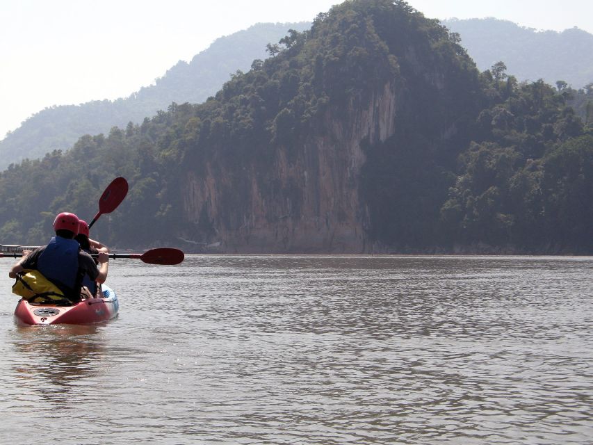 Luang Prabang: Kayak Tour to Pak Ou Caves - Kuang Si Falls time: swim pools, trails, and the bear rescue center