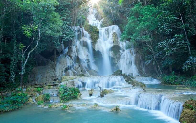 Luang Prabang: Kuang Si Bike Ride & Long-Tail Boat Cruise - The paved-road bike ride to Kuang Si, about 30 to 35 km