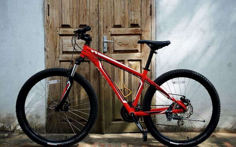 Luang Prabang: Kuang Si Bike Ride & Long-Tail Boat Cruise - Hotel pickup, bike shop setup, and getting the gear right
