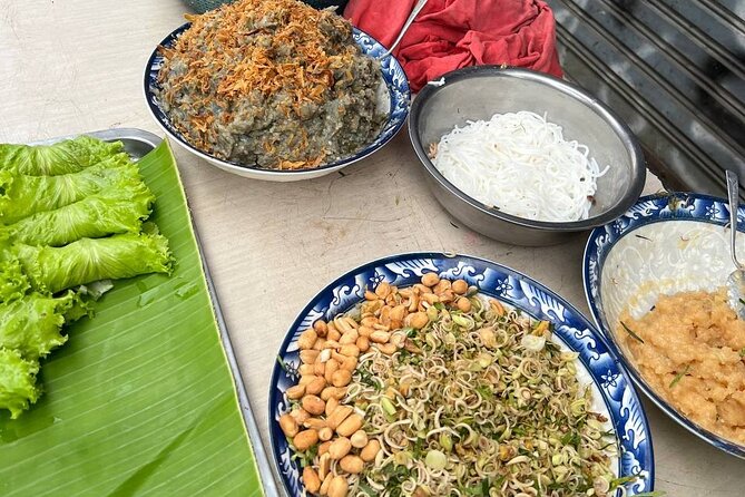 Luang Prabang Local Market and Morning Food Tour with Drinks - Stop 1 in old Luang Prabang: royal capital context before you eat