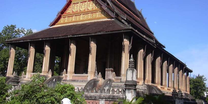 Luang Prabang: Local Village & Kuang Si Falls Private Tour - Wat Siphouthabath for sunset: stupa glow in golden light