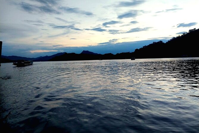 Luang Prabang Mekong Sunset Cruise and Hot Pot Dinner - Getting to the Mekong: tuk-tuk transport and the Royal Palace jetty area