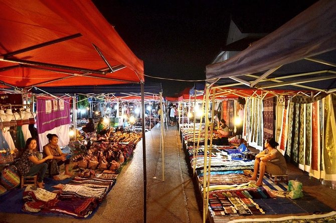 Luang Prabang Night-time Explorer - Playing petanque with locals by Wat Prabat Tai