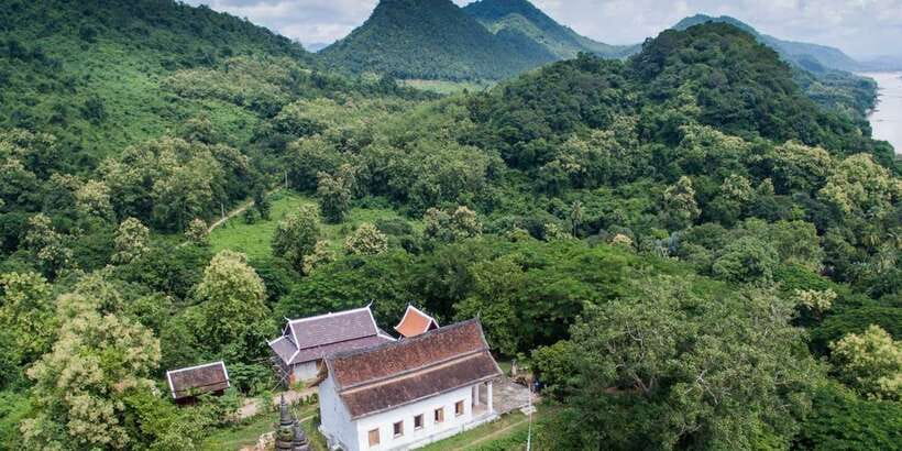 Luang Prabang: Pottery Workshop & Wat Chomphet cycling Tour - Quiet cycling in Chomphet district, away from heavy traffic
