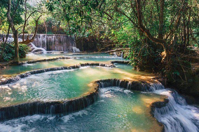 Pak Ou Caves and Kuang Si Fall Day Tour - Mekong time and the payoff at Pak Ou Caves