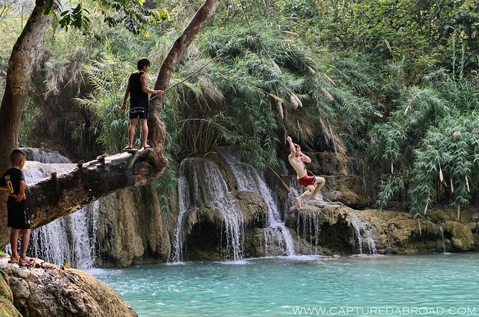 Pak Ou Caves and Kuang Si Fall Day Tour - Kuang Si Falls: three tiers and swim-pool breaks