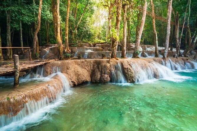 Private Tour: Pak Ou Cave and Kuang Si Waterfall Tour from Luang Prabang - Pak Ou Caves: Thousands of Buddha Statues and a Real Pilgrimage Feel