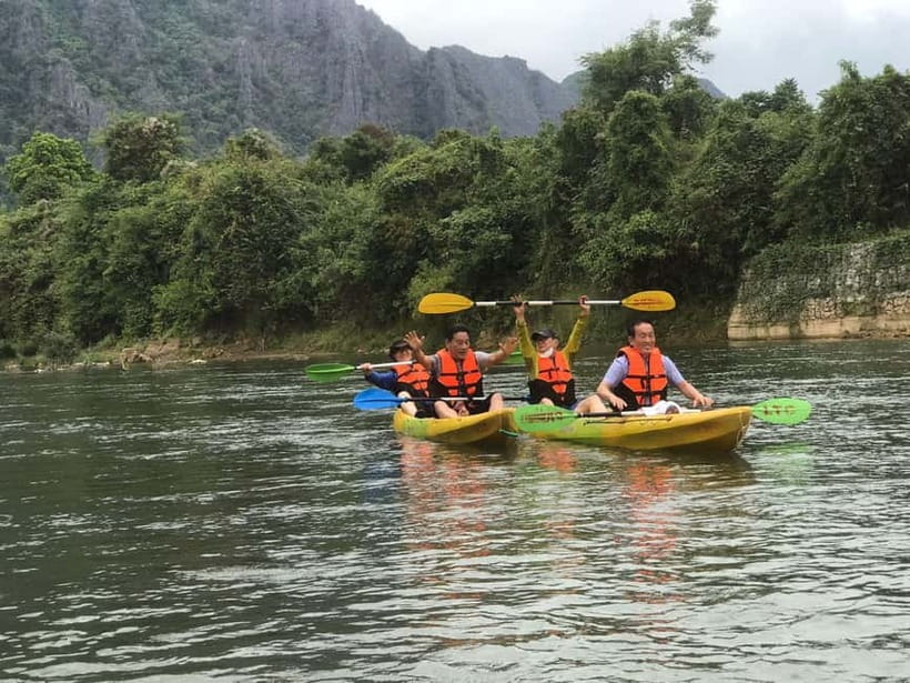 Vang Vieng: Day Tour with Kayaking, Ziplining, and Rafting - Why this mix of kayaking, caves, zipline, and Blue Lagoon makes sense